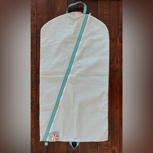 Mint turquoise seersucker hanging garment bag. NWT.